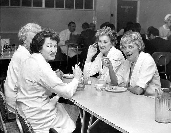Procter and Gamble staff in their canteen in 1968