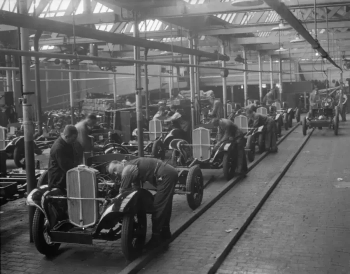 Framed Print : Production line at the Triumph car factory in Coventry. 23 September 1931 Framed Print : Production line at the Triumph car factory in Coventry. 23 September 1931