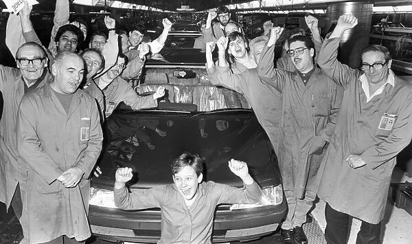Production line workers at the Peugeot factory at Ryton are seen here celebrating the Car