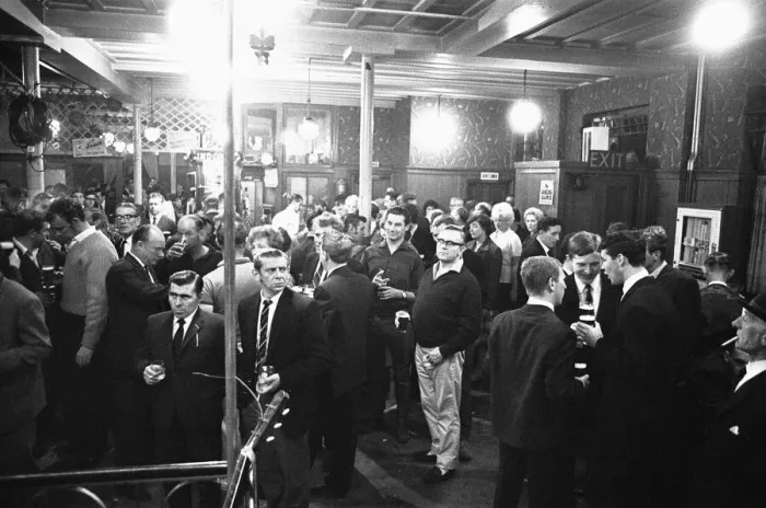 Framed Print : Pub goers awaiting the cabaret at a pub in Londons East End on a Saturday night Framed Print : Pub goers awaiting the cabaret at a pub in Londons East End on a Saturday night