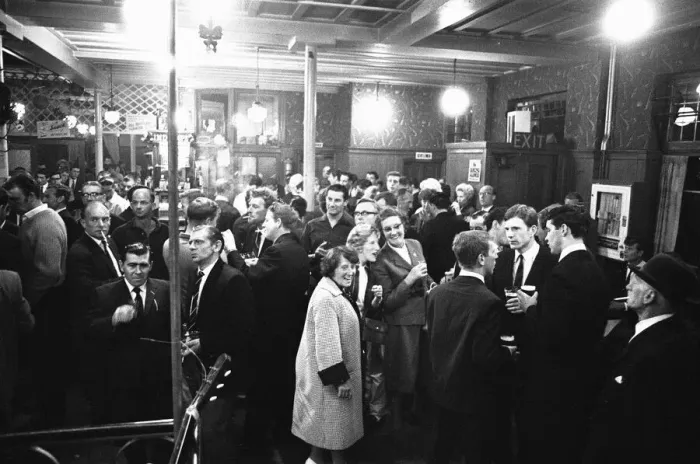 Framed Print : Pub goers awaiting the cabaret at a pub in Londons East End on a Saturday night Framed Print : Pub goers awaiting the cabaret at a pub in Londons East End on a Saturday night
