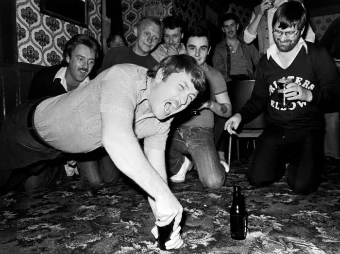 Framed Print : Pub Olympics. bar divers, chairlifters and bottle walkers at the Cat Framed Print : Pub Olympics. bar divers, chairlifters and bottle walkers at the Cat