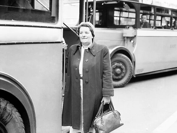 Public Transport Buses. Woman thanks helpful conductoress with a cheerful goodbye on a