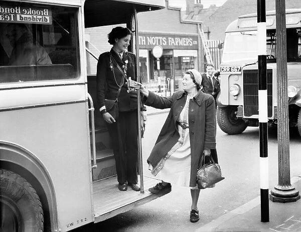 Public Transport Buses. Woman thanks helpful conductoress with a cheerful goodbye on a