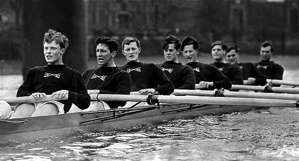 Pulling together, Oxford University boat race crew on the tideway at Putney