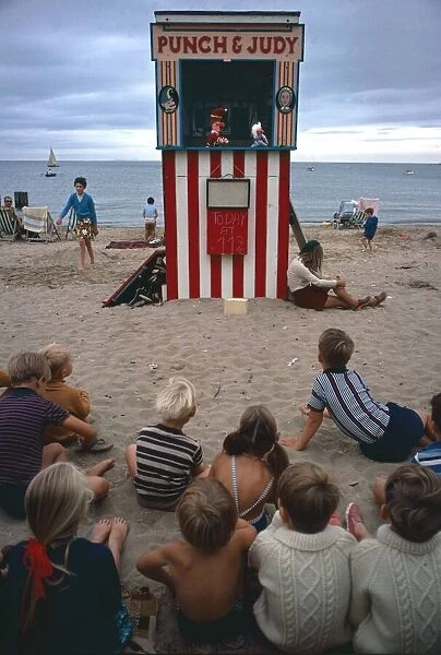 Punch and Judy show on Swanage beach, Dorset. 1970s August 1972