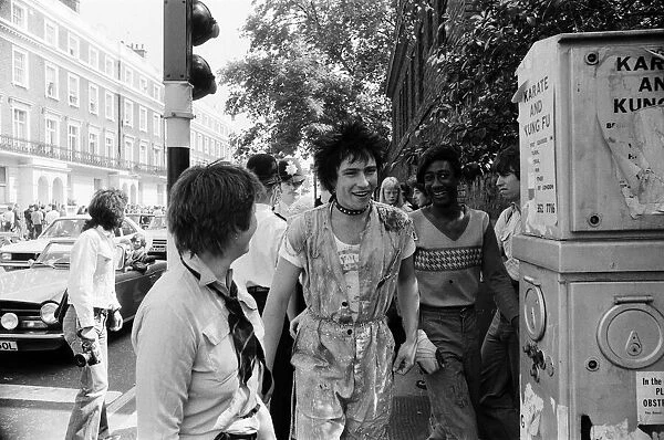 Punk Rocker and Teddy Boy youths in Kings Road, London. Pictured, a punk