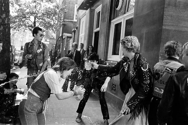 Punks and Teddy Boys outside Horseferry magistrates court. 1st August 1977