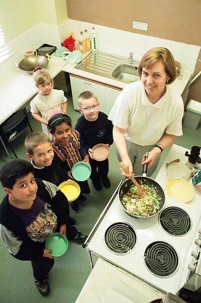 Pupils at Abingdon Road Infants School, Middlesbrough, in the special kitchen learn about