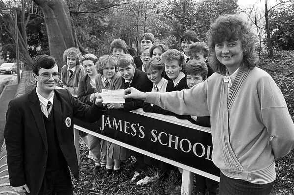 Pupils of King James School Almondbury present a cheque for £150