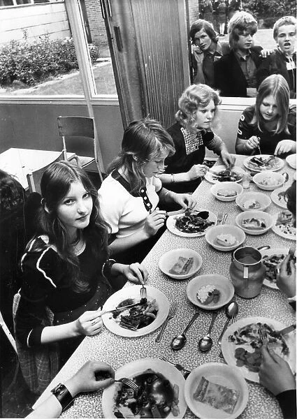 These pupils are not so sure whether to enjoy their school dinners