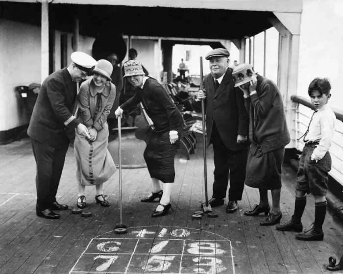 Framed Print : The Purser of the Minnekhada shows our prizewinners how to play Deck Golf Framed Print : The Purser of the Minnekhada shows our prizewinners how to play Deck Golf