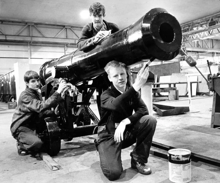 Framed Print : Putting the finishing touches to a repleca cannon are Graham War Framed Print : Putting the finishing touches to a repleca cannon are Graham War