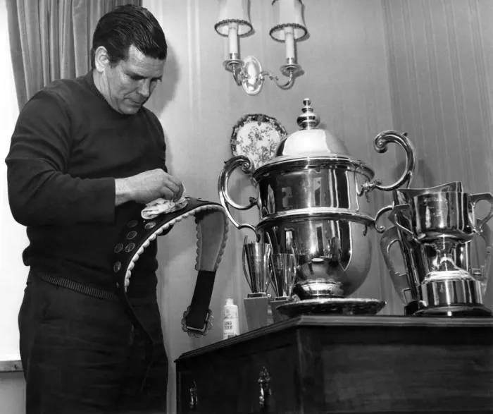 Framed Print : Putting a shine on one of his trophies is British wrestler Count Bartelli in his Crewe Framed Print : Putting a shine on one of his trophies is British wrestler Count Bartelli in his Crewe