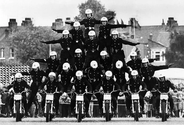 A pyramid by the Royal lSignals Display Team (The White Helmets)