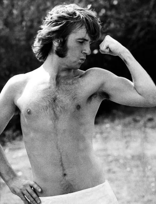Framed Print : Q. P. R. star Stan Bowles shows of his muscles during Queens Park Rangers team training Framed Print : Q. P. R. star Stan Bowles shows of his muscles during Queens Park Rangers team training