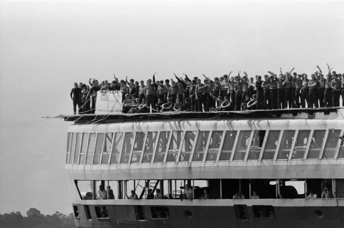 Framed Print : QE2 returns home to Southampton. Union Jacks are festooned on cars, draped on shoulders Framed Print : QE2 returns home to Southampton. Union Jacks are festooned on cars, draped on shoulders