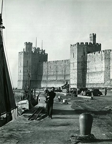 The quay outside the walls of Caernarfon Castle. Inside the castle walls is where