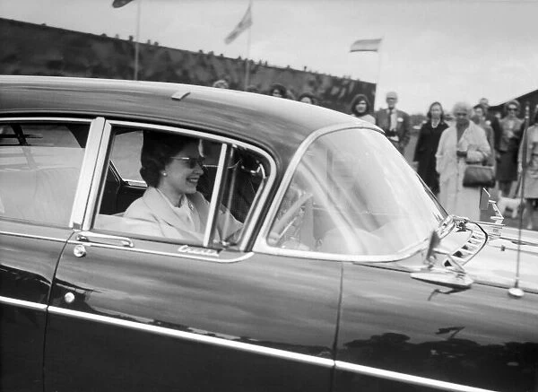 The Queen driving her car. 1965
