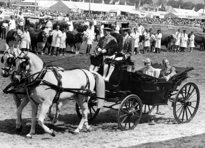Framed Print : The Queen and Duke of Edinburgh arrive at the main showering to see the grand parade Framed Print : The Queen and Duke of Edinburgh arrive at the main showering to see the grand parade