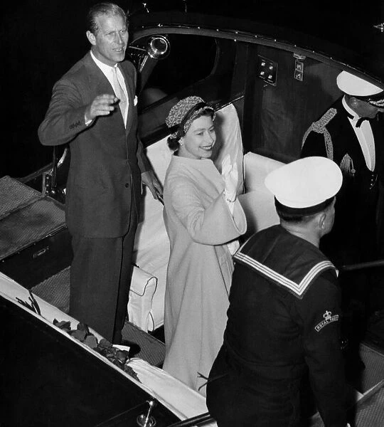 The Queen and the Duke of Edinburgh wave to the Danish Royal Family. May 1957 P000143