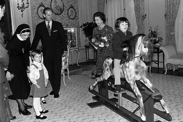 Queen and Duke present a traditional British rocking horse of Victorian design