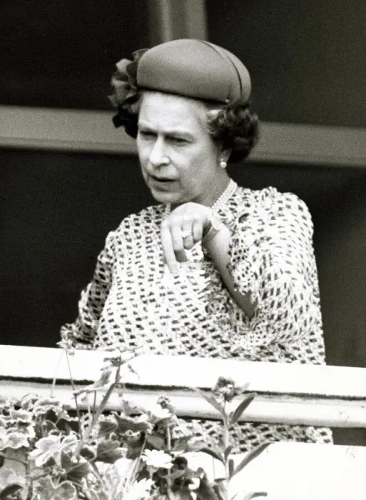 Framed Print : Queen Elizabeth II at Derby Day 1982 at Epsom Pointing downwards at possible Framed Print : Queen Elizabeth II at Derby Day 1982 at Epsom Pointing downwards at possible