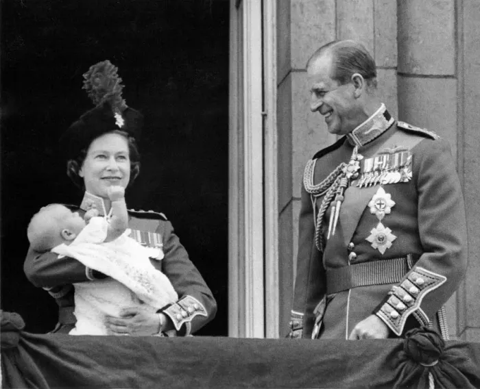 Framed Print : Queen Elizabeth II holds her youngest son Prince Edward in her arms as she stands with Framed Print : Queen Elizabeth II holds her youngest son Prince Edward in her arms as she stands with