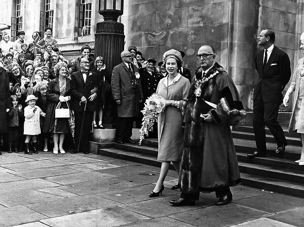 Queen Elizabeth II leaves the Guildhall, Swansea, with Mayor Alderman F. C Jones