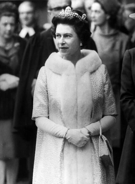 Queen Elizabeth II leaves St Giles in Scotland wears fur trimmed coat and tiara