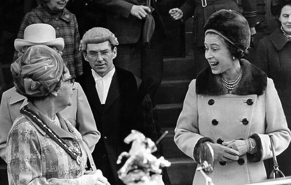 As Queen Elizabeth II leaves the Town Hall, Merthyr, she jokes with the Mayoress (Mrs C