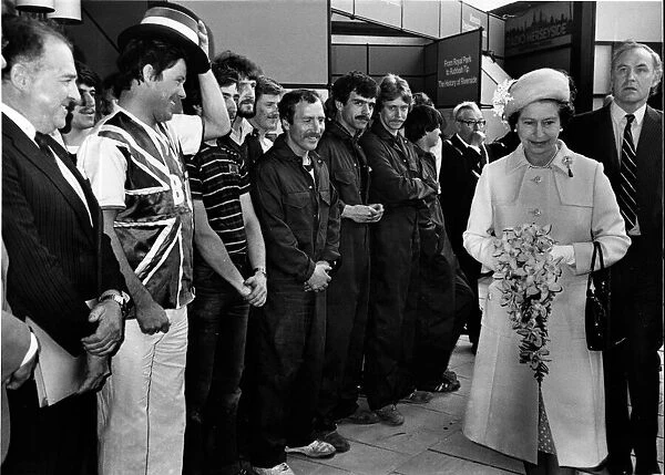 Queen Elizabeth II in Liverpool. The Queen walks past various member of Liverpool