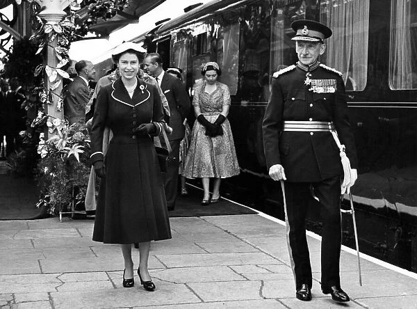 Queen Elizabeth II with Lord Lieutenant, Major-General G. T. Raikes at Brecon Station