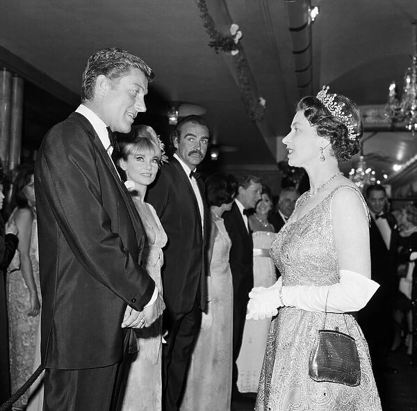 Queen Elizabeth II meets Dick Van Dyke at the premiere of You Only Live Twice