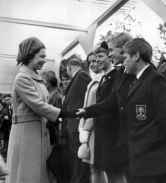 Queen Elizabeth II meets schoolboys Graham Booth and Paul Allen, both 13