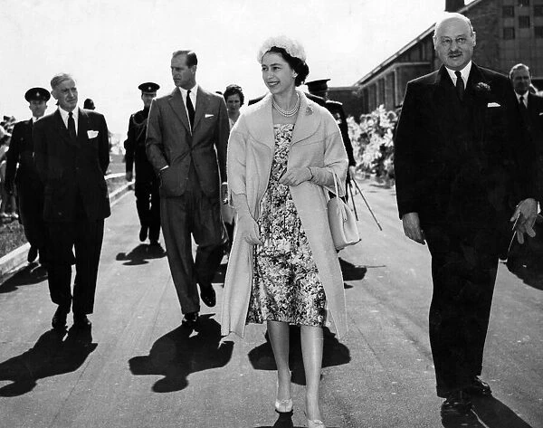 Queen Elizabeth II and Prince Philip, Duke of Edinburgh walk to Durham County Council