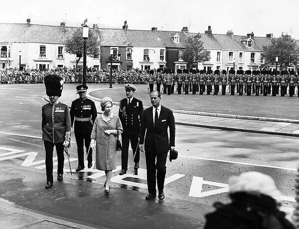 Queen Elizabeth II and Prince Philip, Duke of Edinburgh walk back to the Guildhall