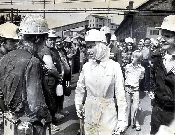 Queen Elizabeth II and Prince Philip meet Miners and Pit B officials during a tour of