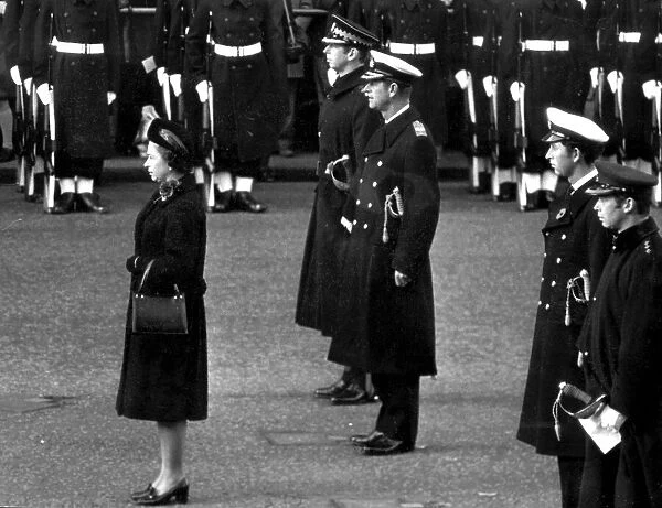 Queen Elizabeth II, Prince Philip and Prince Charles at a Remembrance Day ceremony at