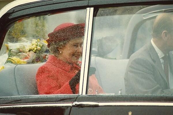 Queen Elizabeth II and Prince Philip visit Cumbria 3 May 1991- arriving in the car