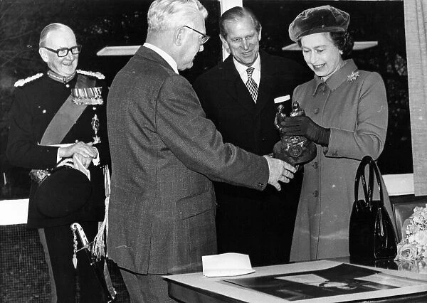 Queen Elizabeth II and Prince Philip visits Newcastle - Coun Les Watson presents