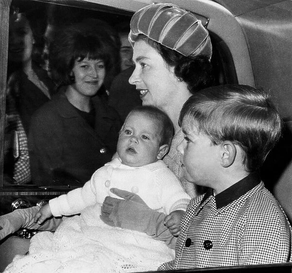 Queen Elizabeth II with Princes Edward and Andrew leaves Euston Station by car after