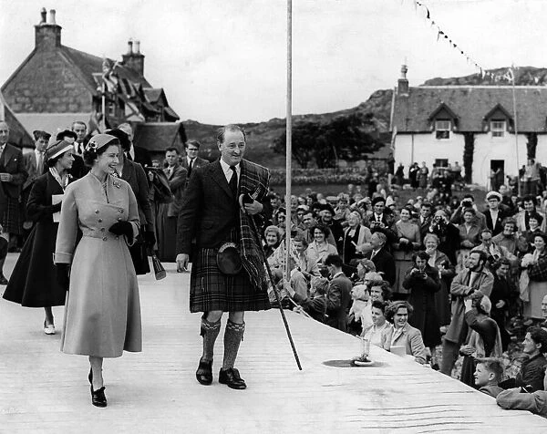 Queen Elizabeth II returns to the jetty at Iona, off the western coast of Scotland