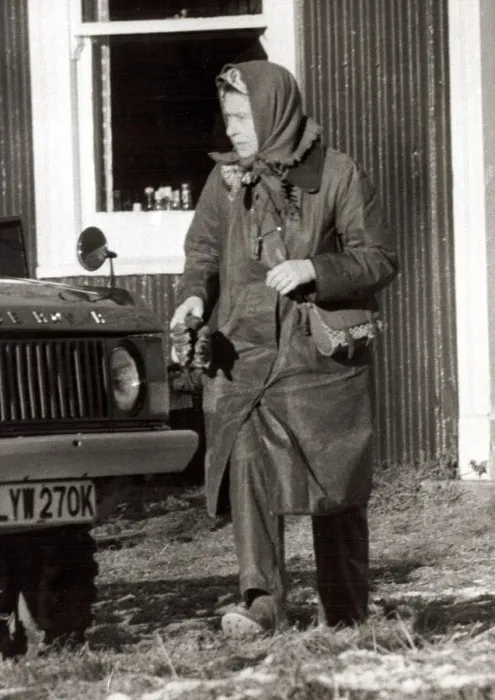 Framed Print : Queen Elizabeth II at Sandringham in Norfolk Outdoor clothing holding cloth