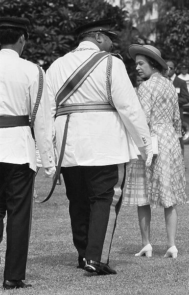 Queen Elizabeth II seen here in Tonga with the King Taufa