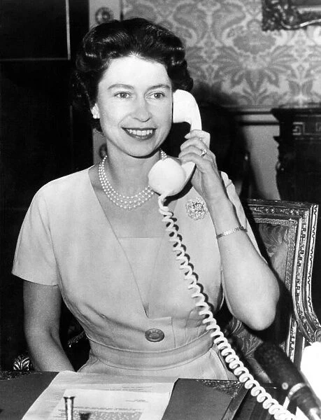Queen Elizabeth II speaking to the Prime Minister of Canada, Mr Diefenbaker