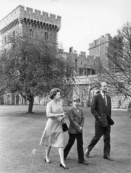 Queen Elizabeth II takes a stroll in the grounds of Windsor Castle with Prince Philip