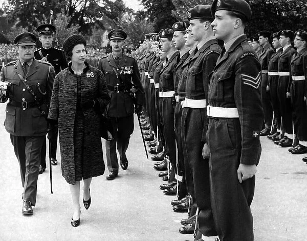 Queen Elizabeth II during her visit to Solihull School, The Queen, escorted by Capt