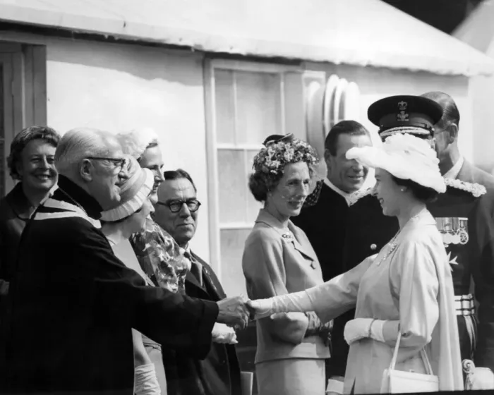 Framed Print : Queen Elizabeth II visiting Wales. The Queen shakes hands with Mr T W Thomas Framed Print : Queen Elizabeth II visiting Wales. The Queen shakes hands with Mr T W Thomas