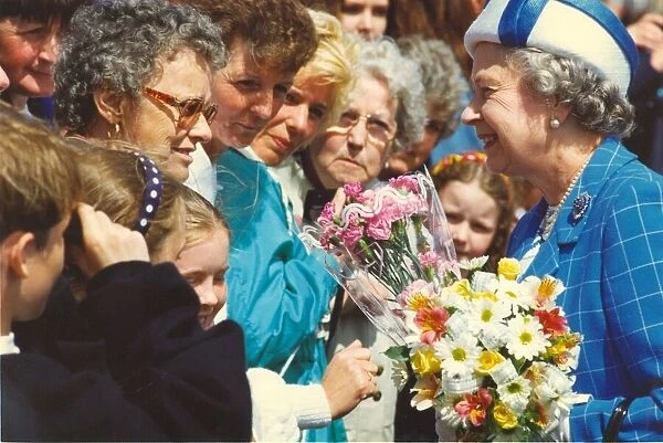 Queen Elizabeth II visits the town of Bedlington in Northumberland meeting the cheering